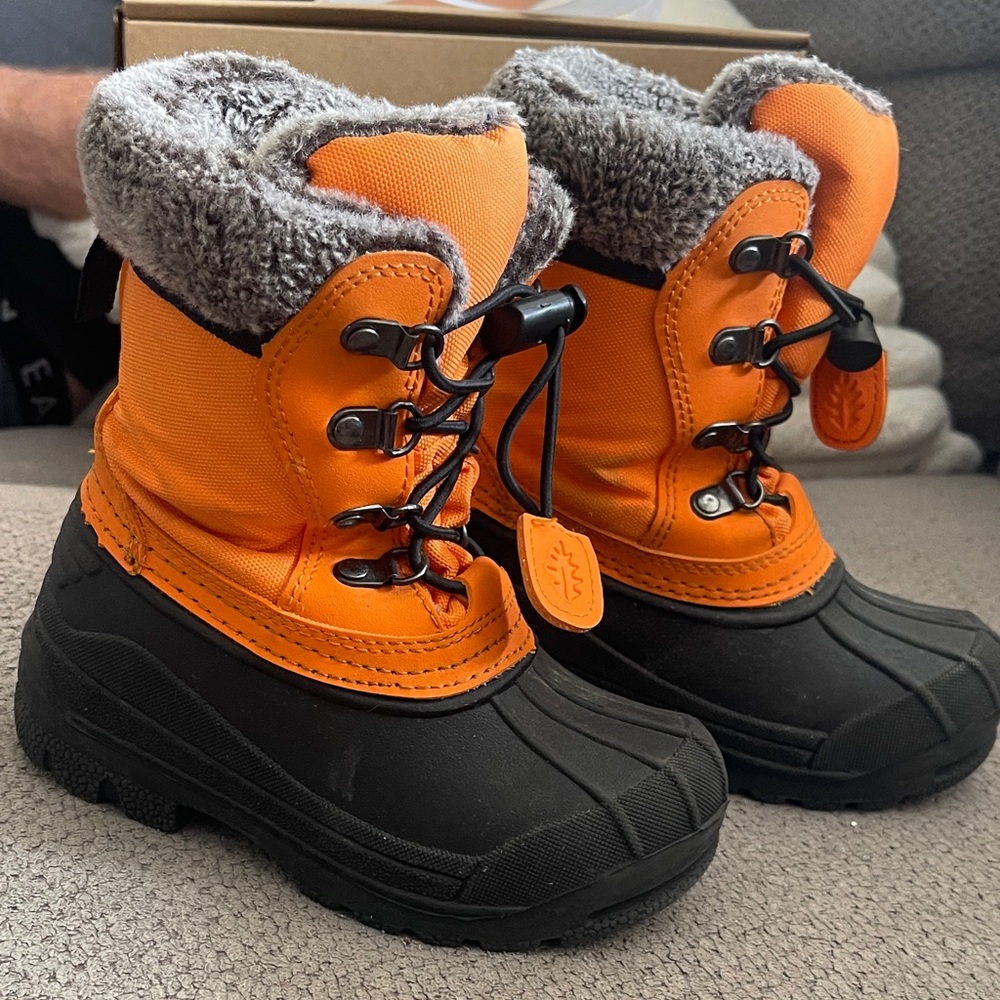 Vibrant Orange and Black Fur-Lined Boots